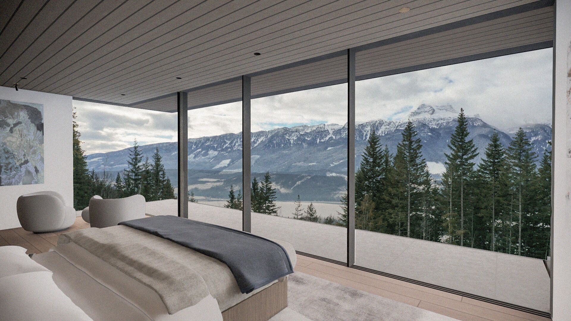 Bedroom with large windows overlooking pine trees and snowy mountains under a cloudy British Columbia sky.
